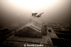 Diving is great  :)     Diver over skylights , ww2 wreck,... by Harald Fauske 